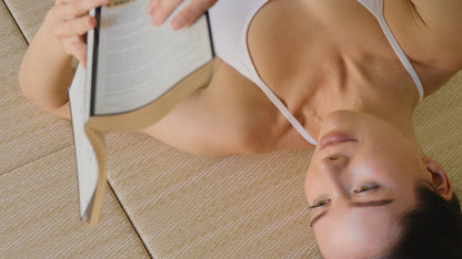 Closeup of woman reading on Japandi Tatami Mats