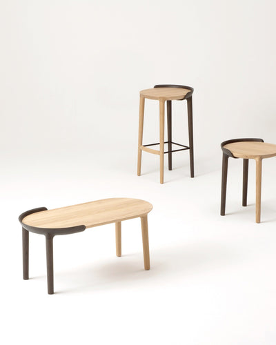 CRUST Coffee Table with CRUST Stools shown in Dark Gray Wash