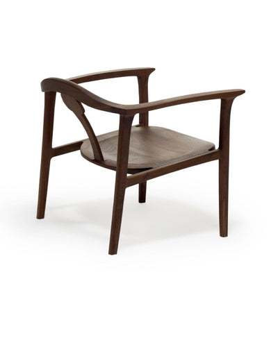 NAGARE Armchair rear view highlighting curved backrest and arms