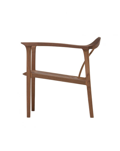 NAGARE Armchair seat and leg detail with light and shadow contrast