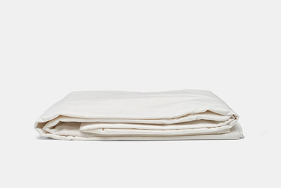 Folded American Blossom Linens cotton percale duvet cover set in white