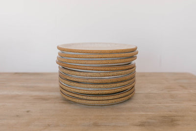 Handmade earthenware dinner plates stacked on wooden table – KJ Pottery