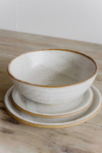 Handmade ramen bowl stacked with Japandi dinnerware plates by KJ Pottery