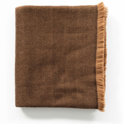 Folded Hay Brown Plush Soft Twill Merino Throw with a short warm-toned fringe against a white background