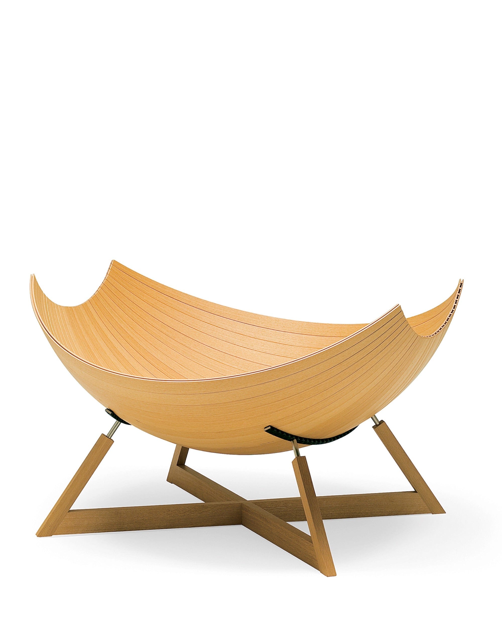 Iconic sculptural lounge chair in natural wood Japandi interior style