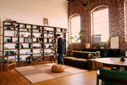 Japandi Tatami Mats in a loft with a man