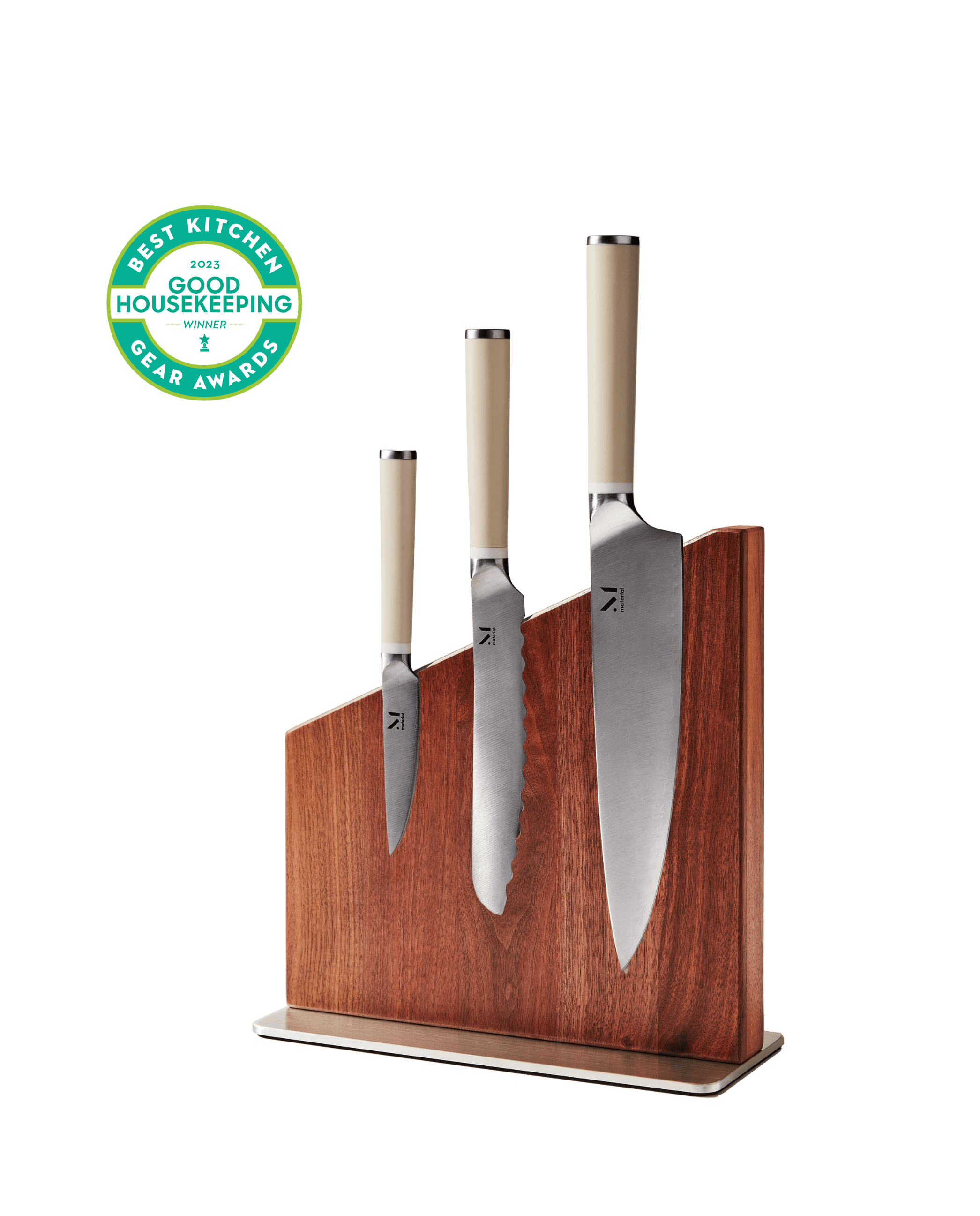 Japanese stainless steel knife trio displayed in magnetic wood stand