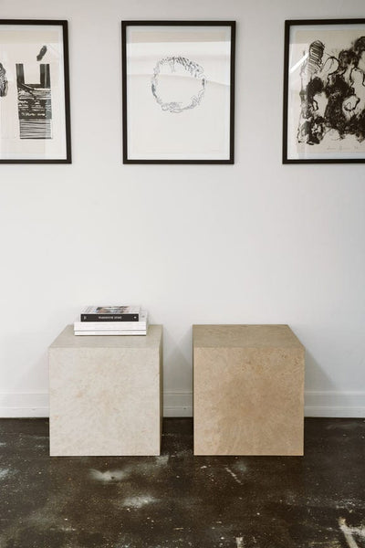 Mater Cube side table styled with books and decorative objects