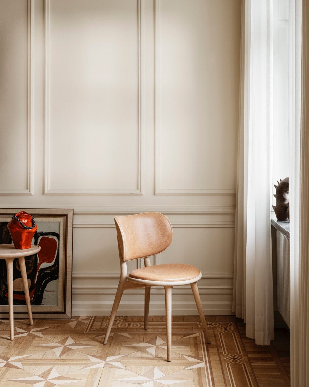 Mater The Dining Chair in matt lacquered oak styled in contemporary interior