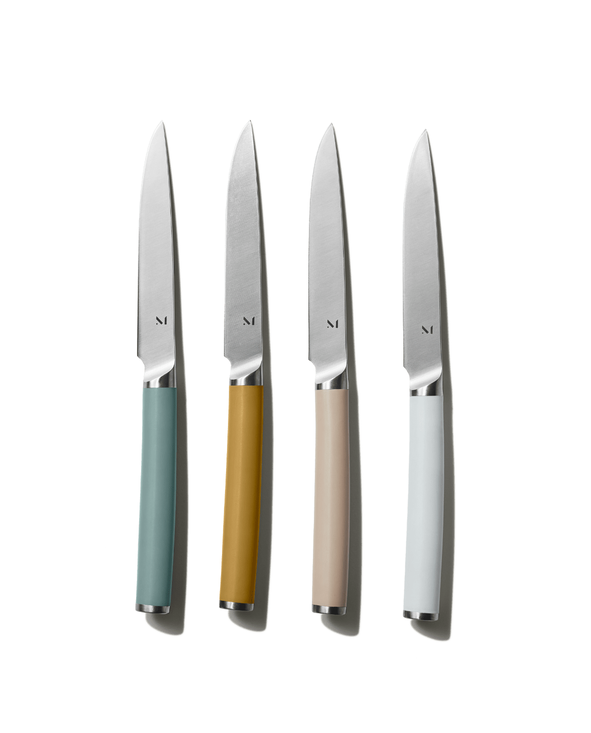 Material Kitchen Table Knives in multiple color finishes displayed side by side, Willow