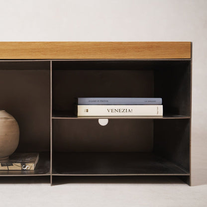 Interior storage detail of Milan media console with open cubbies