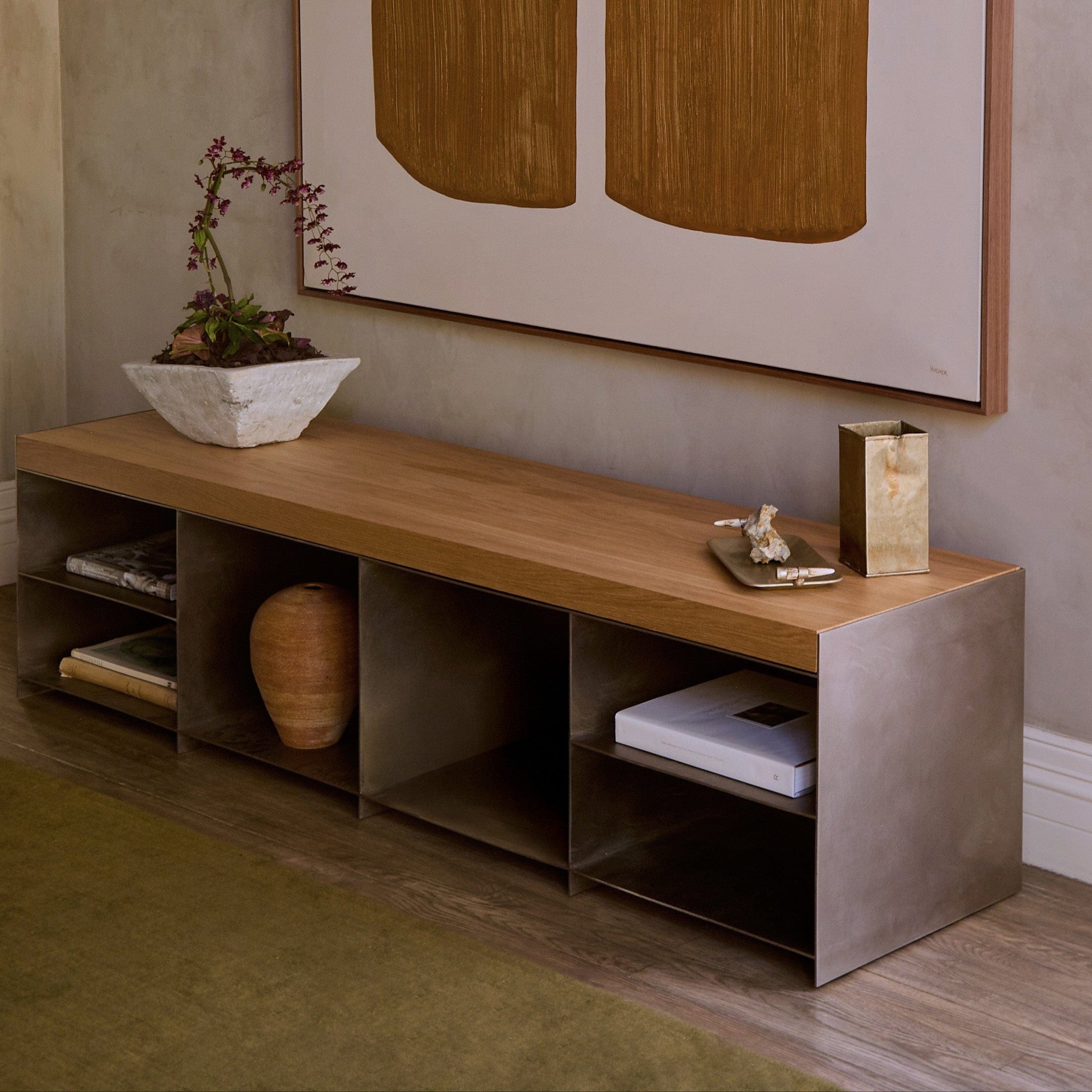 Milan media console styled as entryway bench with art and storage