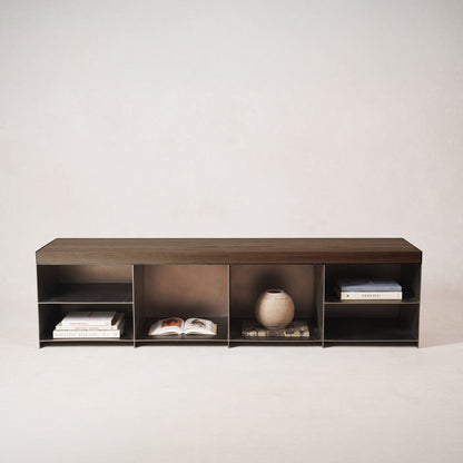 Milan media console styled along wall with shoes and accessories