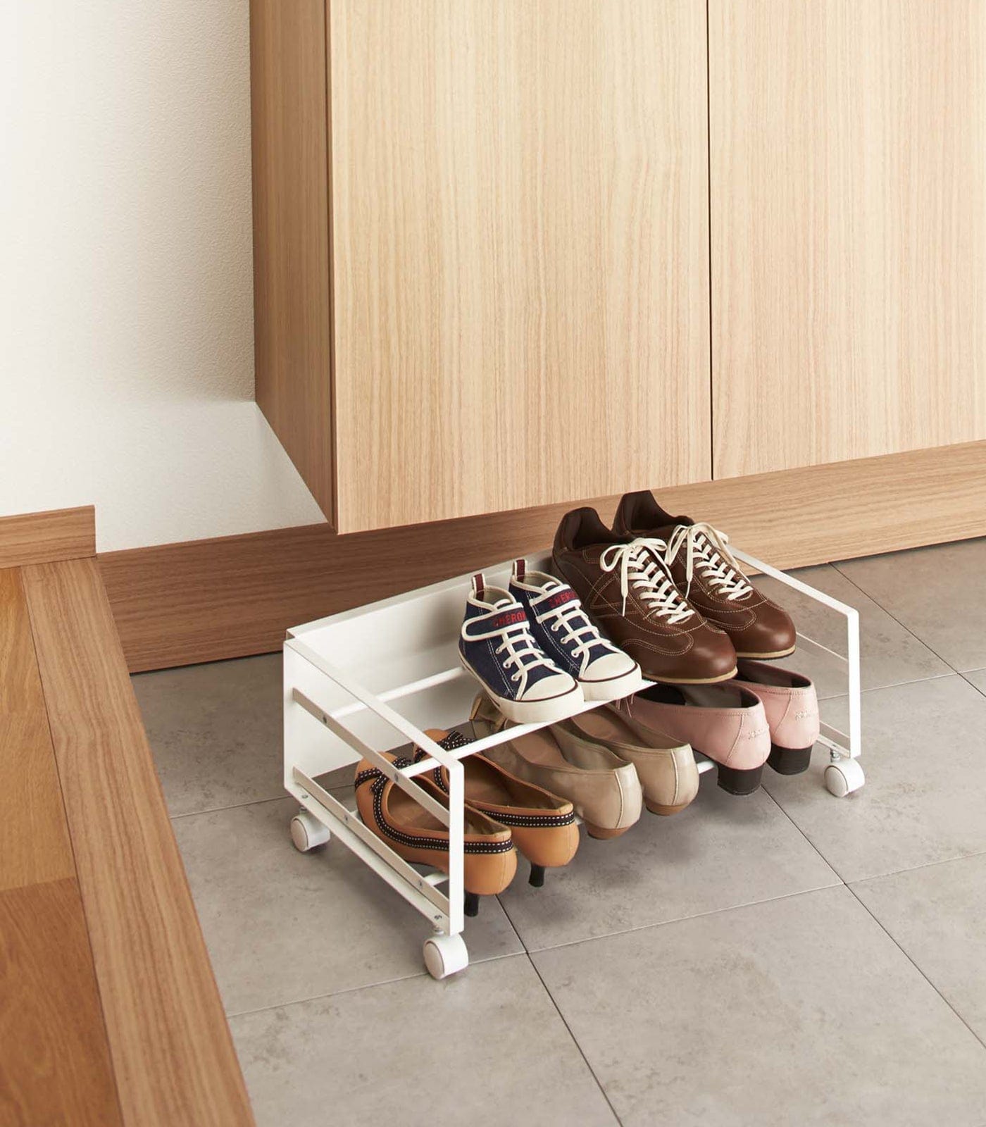 Minimal two-tier shoe rack with wheels