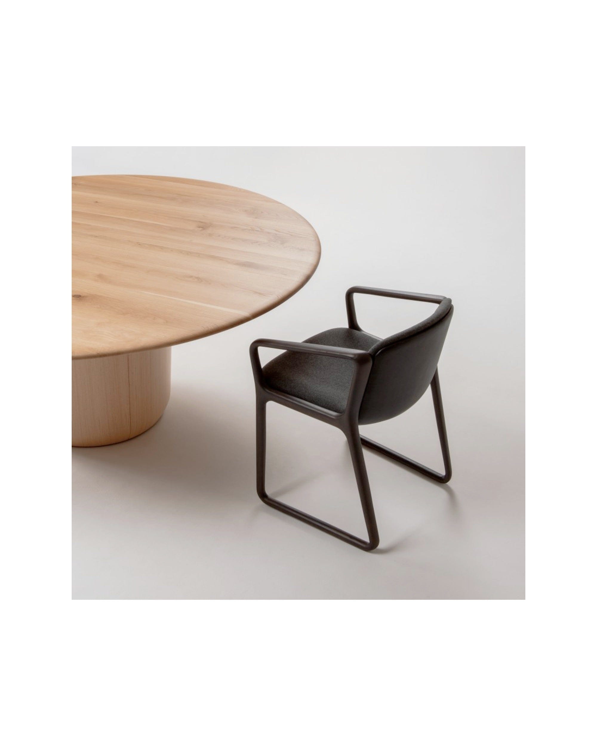 ONE Round Table Japanese Oak Natural paired with EIGHT Armchair by CondeHouse