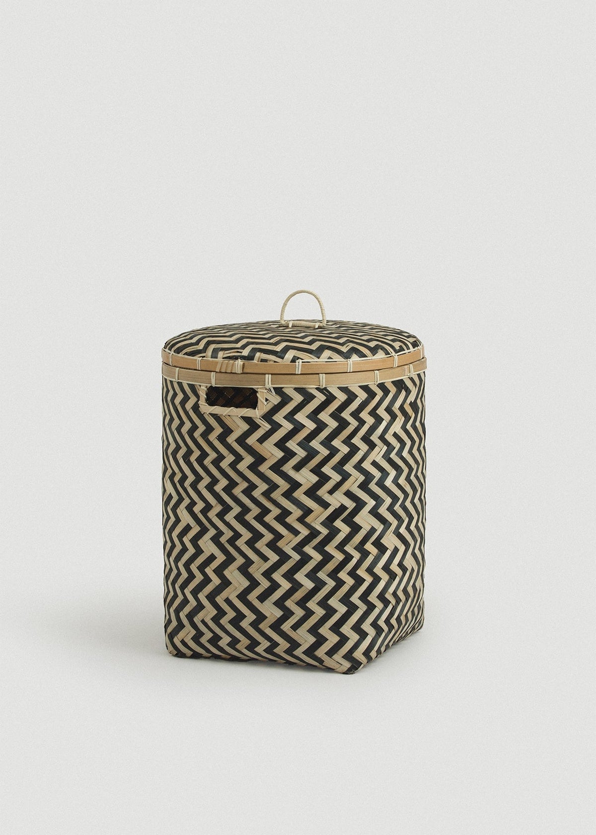 Front view of the Medium Java basket showing its tall shape and rectangular side opening.