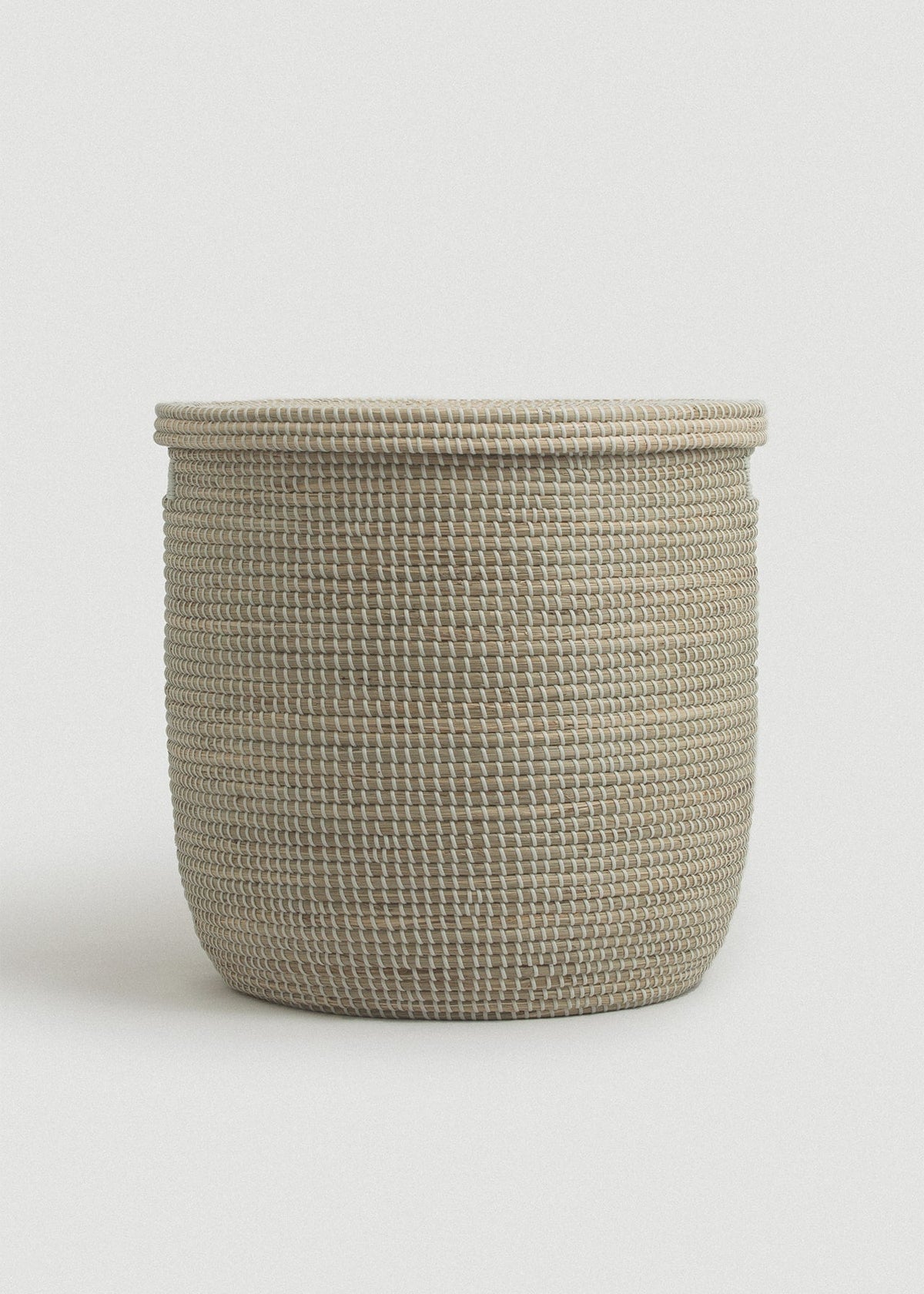 Front view of the large Medina basket showing its tall rounded shape and tightly woven texture.