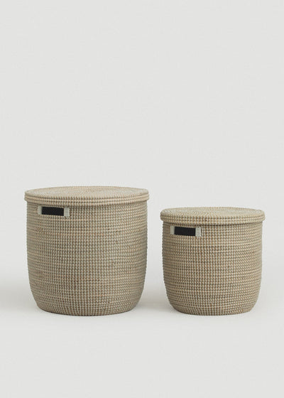 Large and small Medina seagrass baskets displayed together with their lids in place.