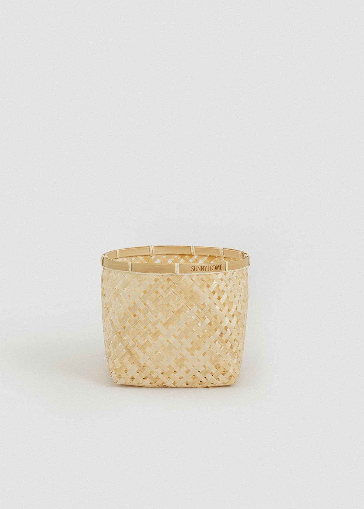 Medium square bamboo basket with gently tapered sides and woven diamond pattern.