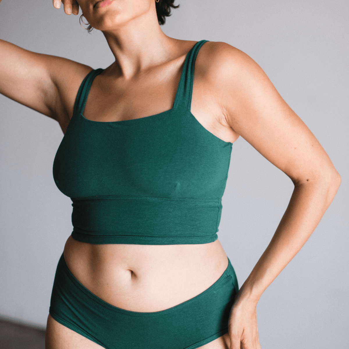 Model wearing PROCLAIM Organic Cotton Square Neck Bralette in Lagoon, front view