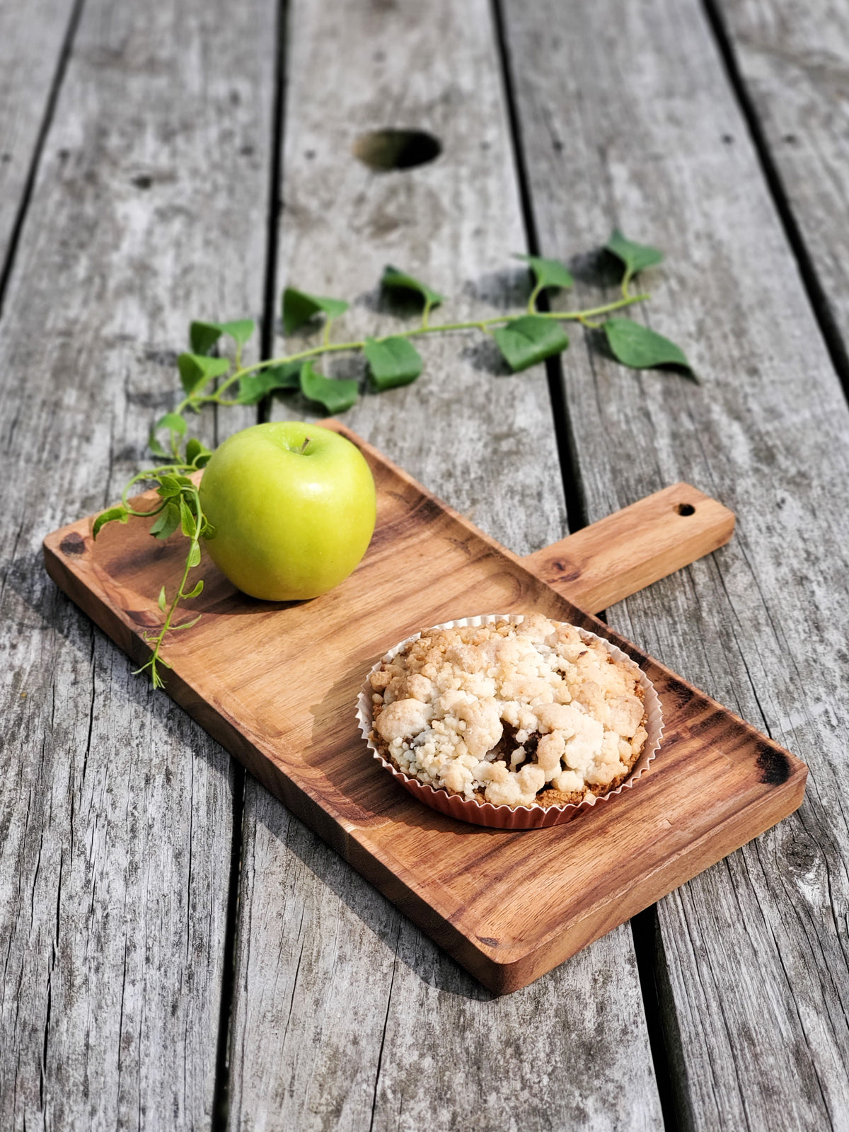 Korissa Wooden Serving Tray with tart and green apple, weathered wood table