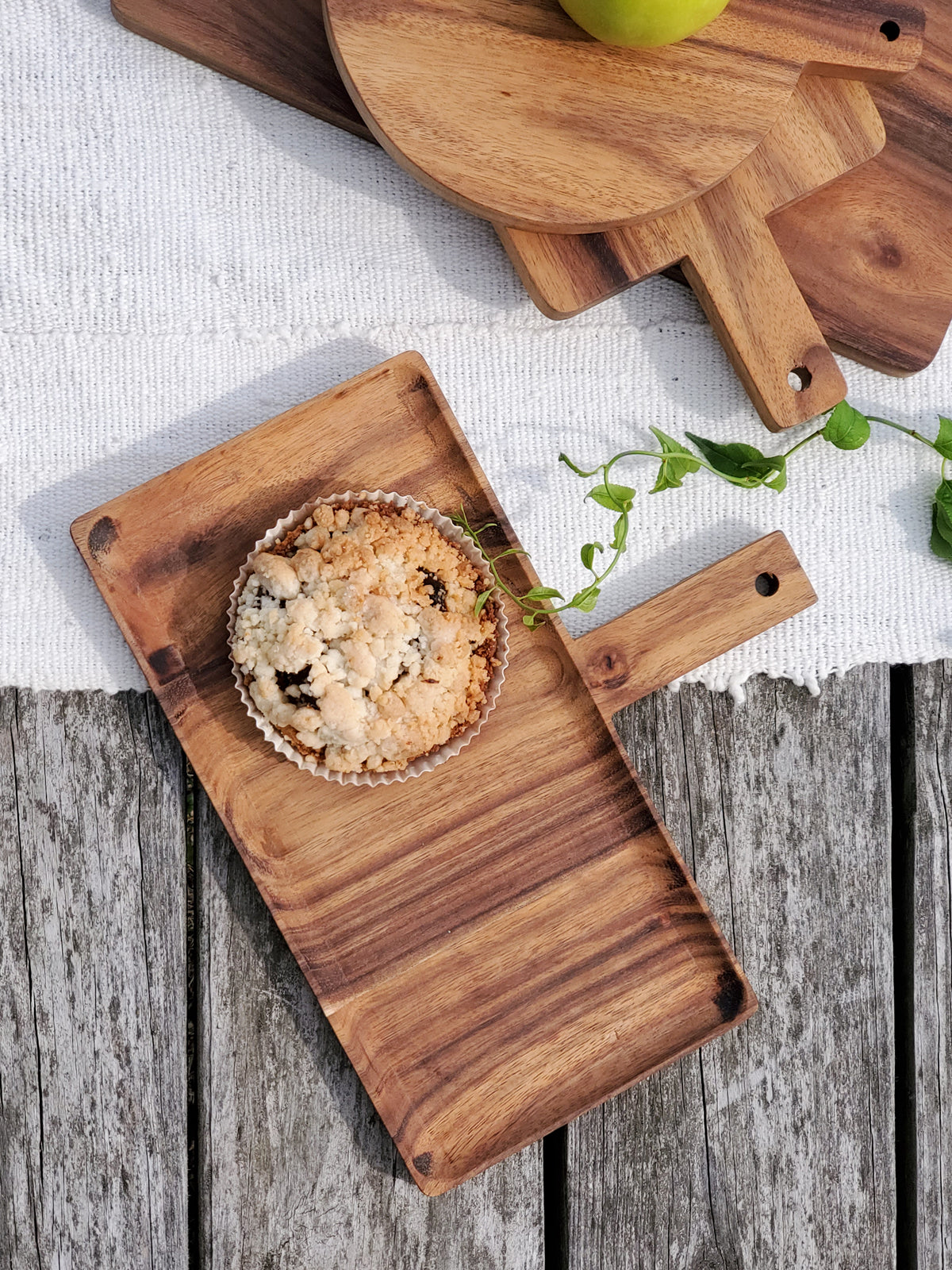 Korissa Wooden Serving Tray with tart, on linen, greenery visible