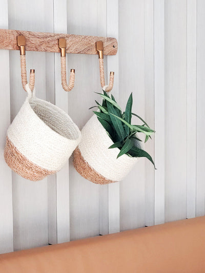 Korissa Amari Loop Bin, set of 2, hanging from wall hooks with plants