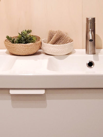 Korissa Kata Candy Bowl on bathroom sink counter with succulent plant