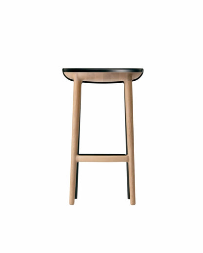 Side view of CRUST Bar Stool showing sculpted solid-oak legs — modern Japandi furniture handcrafted by CondeHouse.