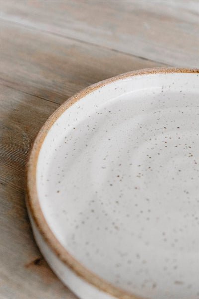 Speckled white handmade earthenware small plate detail by KJ Pottery