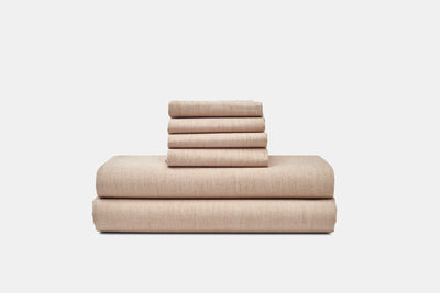 Stacked American Blossom Linens Foxfibre natural colored cotton percale sheet set in Latte Linen