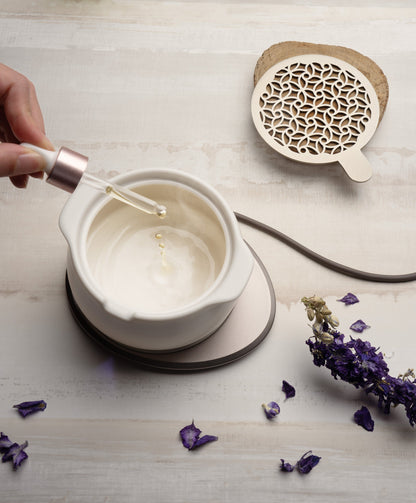 Top view of Jun diffuser releasing aroma through ceramic lid