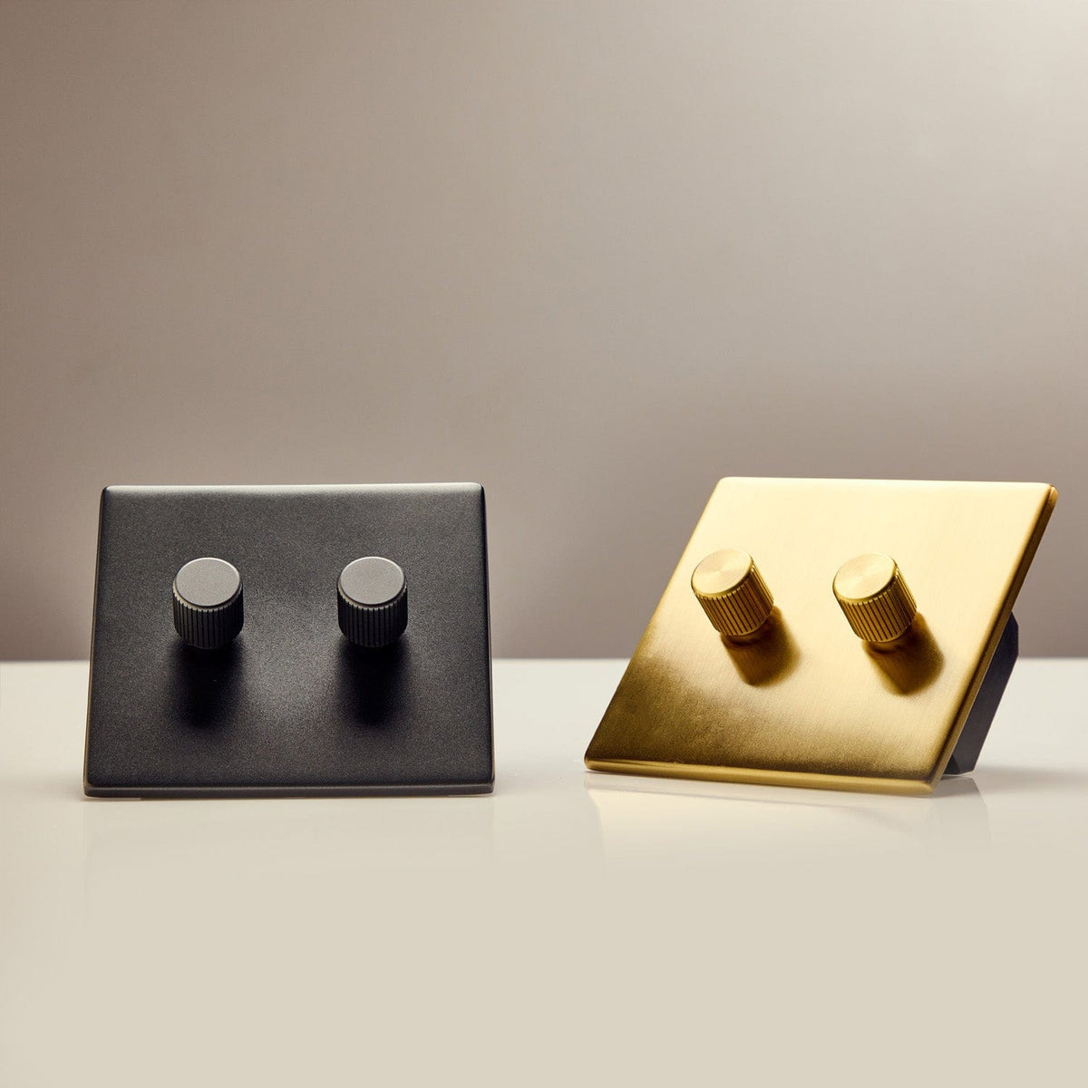 Double Rotary Wall Dimmer in Brass - mounted on wall plate