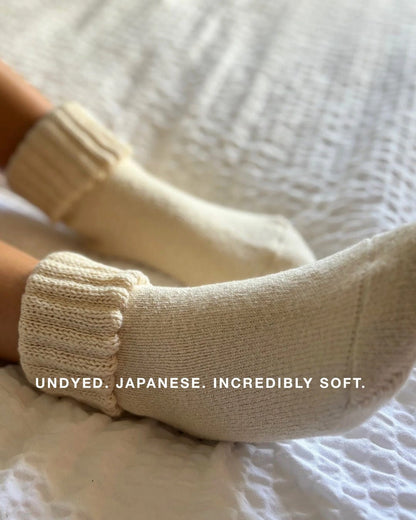 Undyed Organic Cotton Japanese Crew Socks in cream on feet available at Japandi Supply House