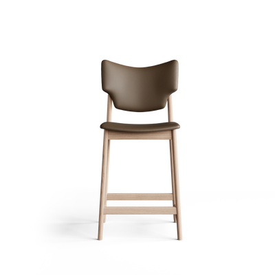 Front view of the Eikund Veng Counter Stool, showing its taupe-brown wing-shaped backrest, slim padded seat, open gap between the cushions, and light wood footrest rails.