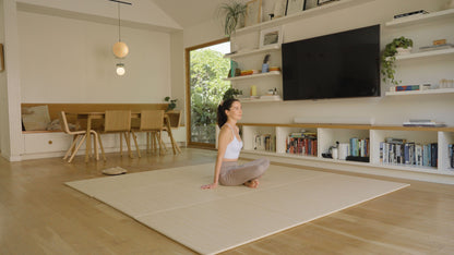 Woman sitting in modern home on Japandi Tatami Mats