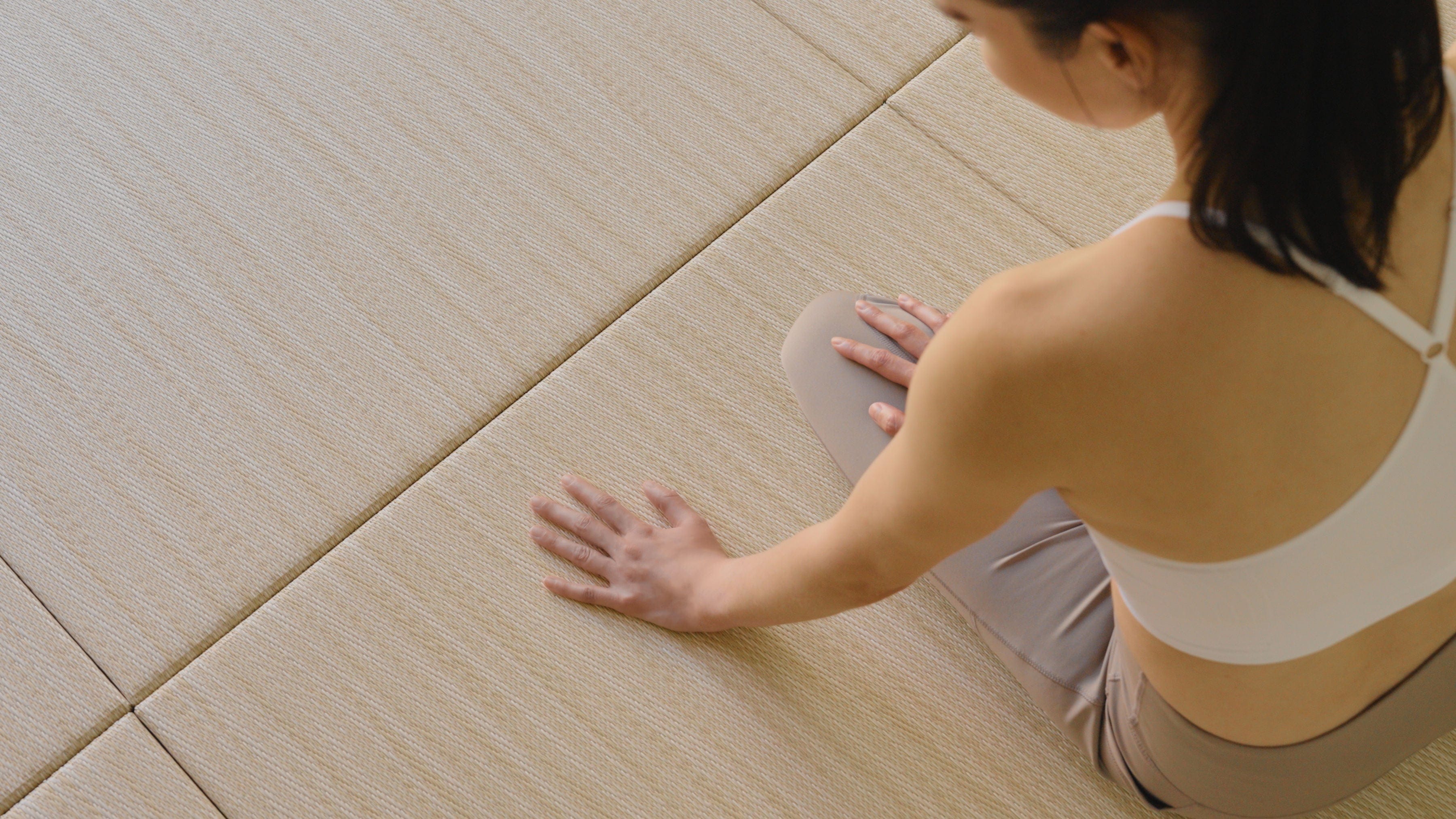 Woman sitting on Japandi Tatami Mats
