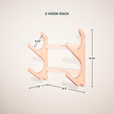 Yoga prop wall rack shown with multiple rolled mats