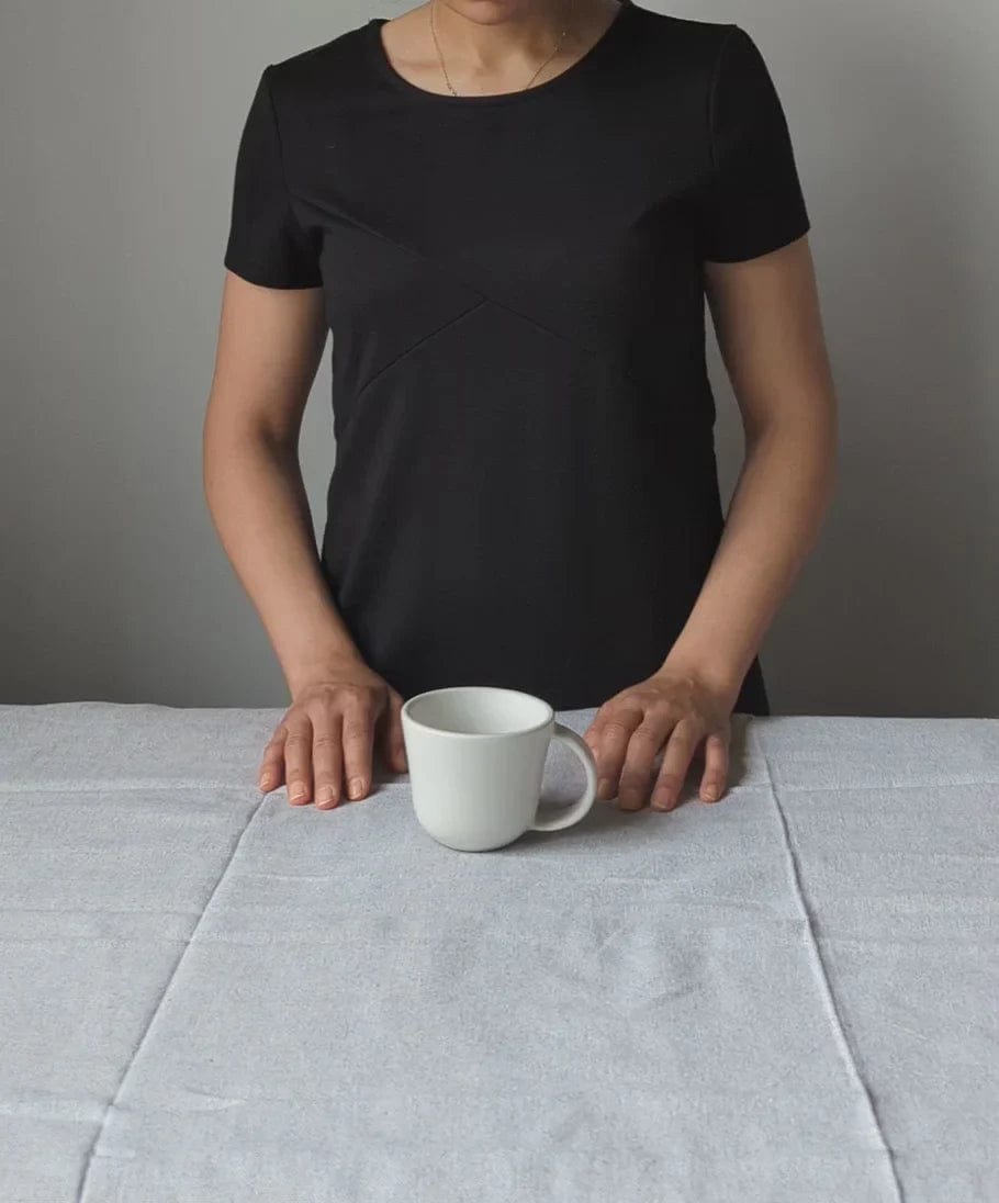Gharyan Stoneware Japandi Tableware Mug, Matte White, held for scale