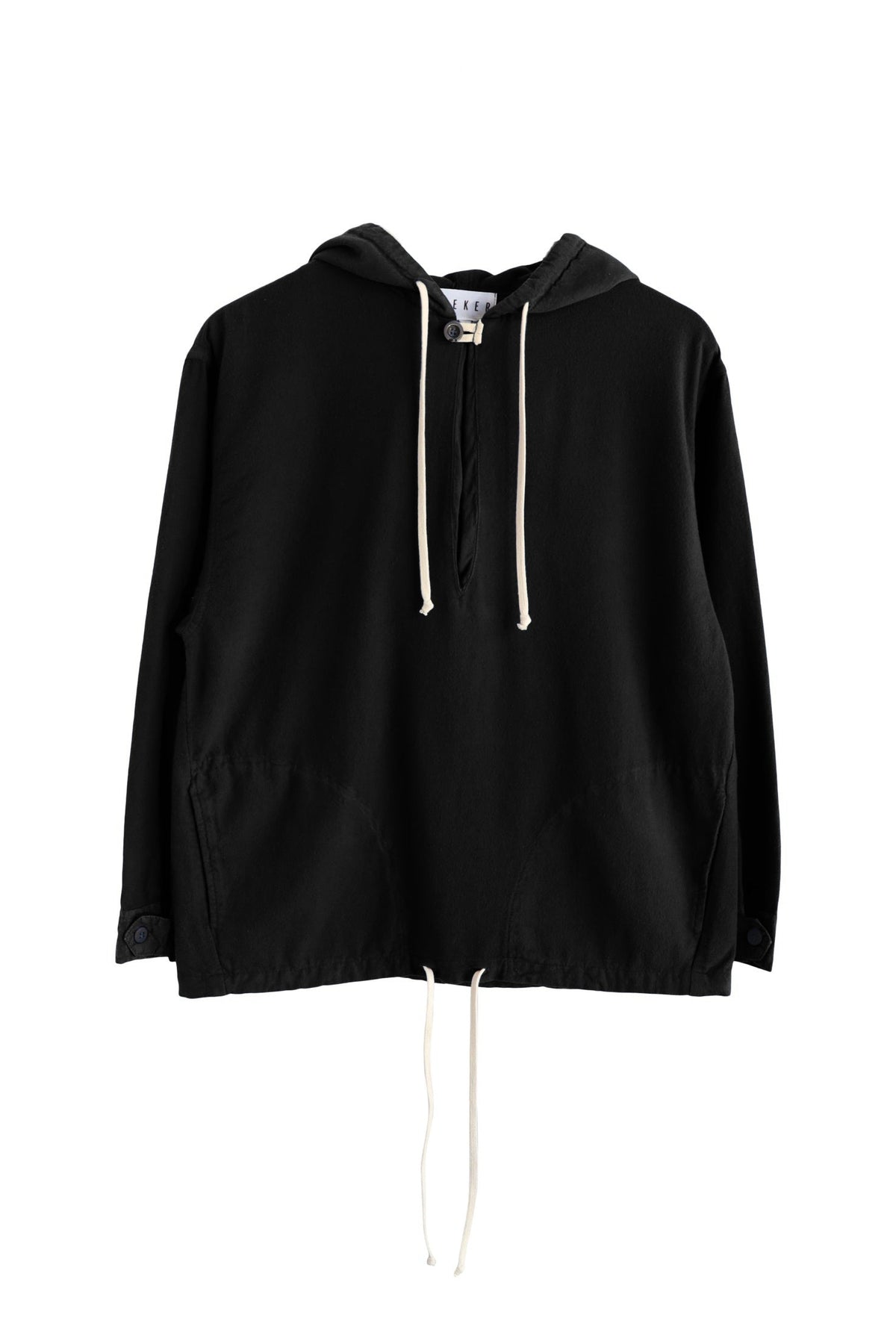 Front product view of the black Anorak with white hood and hem drawcords.