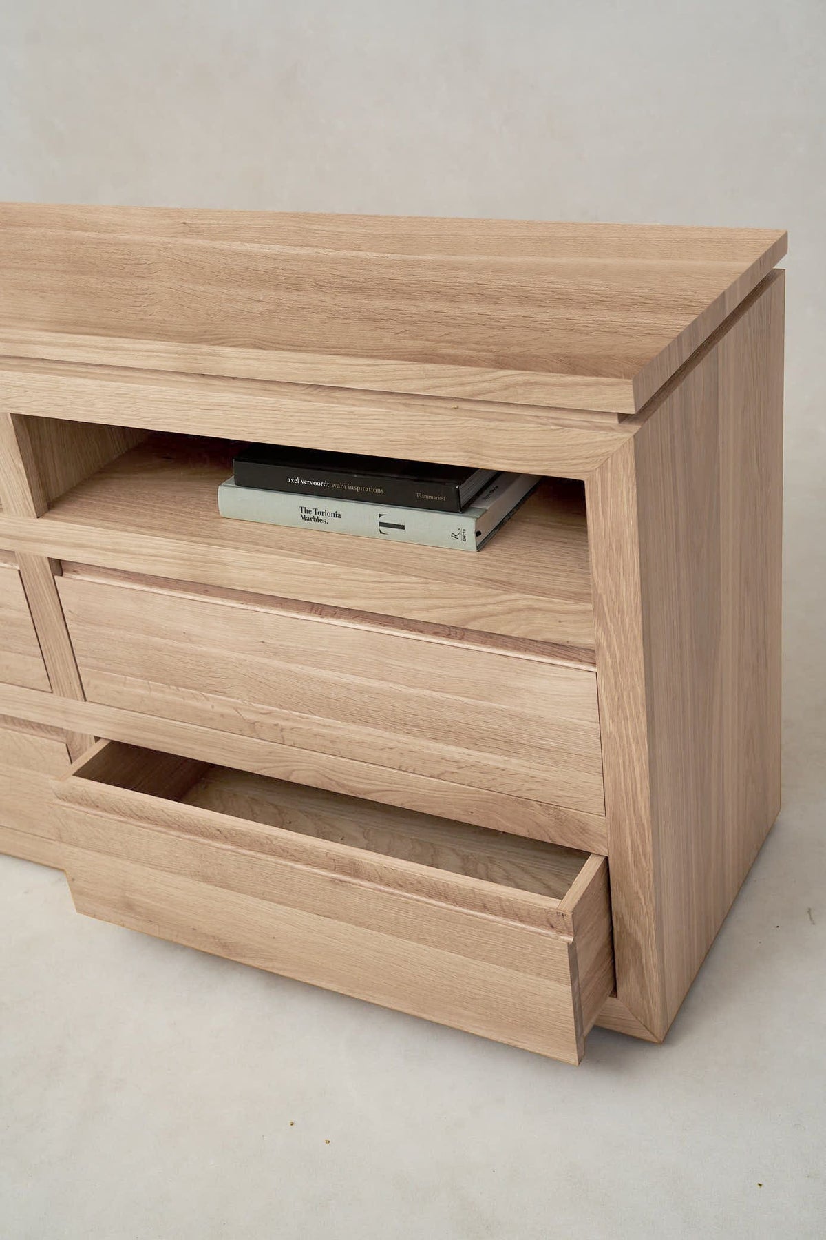 Sofita dresser showing smooth soft-close drawer and interior storage