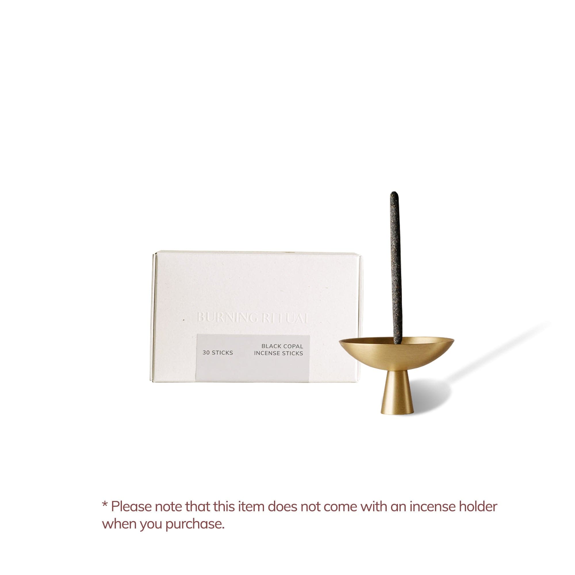Incense stick holder with a box of incense sticks on a white background