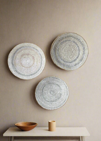 Minimalist Japandi wall decor with handwoven Makenge baskets on wall