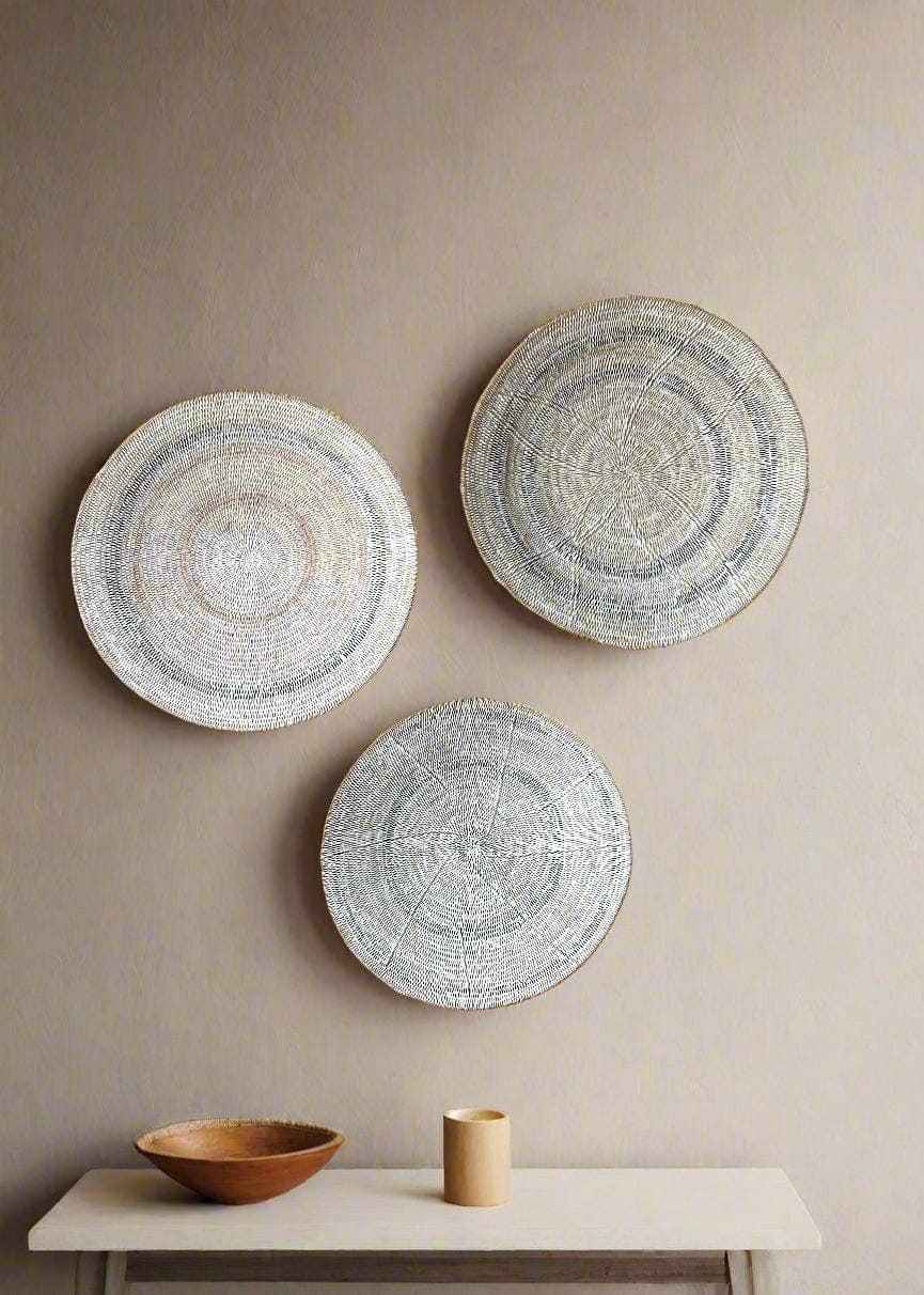 Minimalist Japandi wall decor with handwoven Makenge baskets on wall