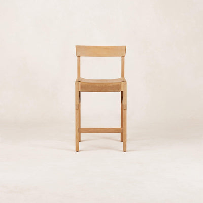 A beige Shinto Counter Stool with a leather seat and wooden frame, inspired by the Torii Gate from Japanese Shinto shrines.