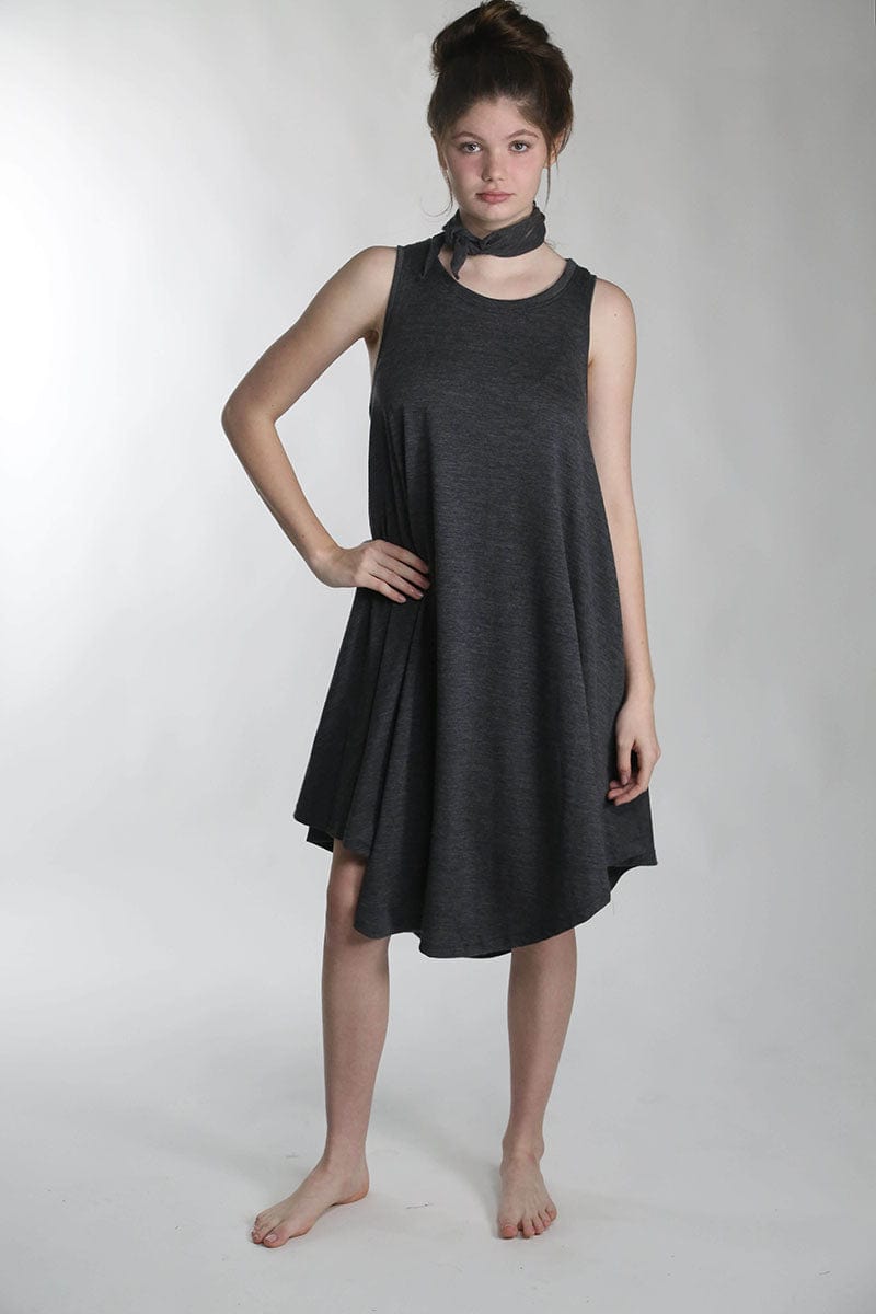Full-length view of a charcoal merino wool sauna dress featuring a relaxed silhouette for sauna, bathing rituals, and everyday comfort.