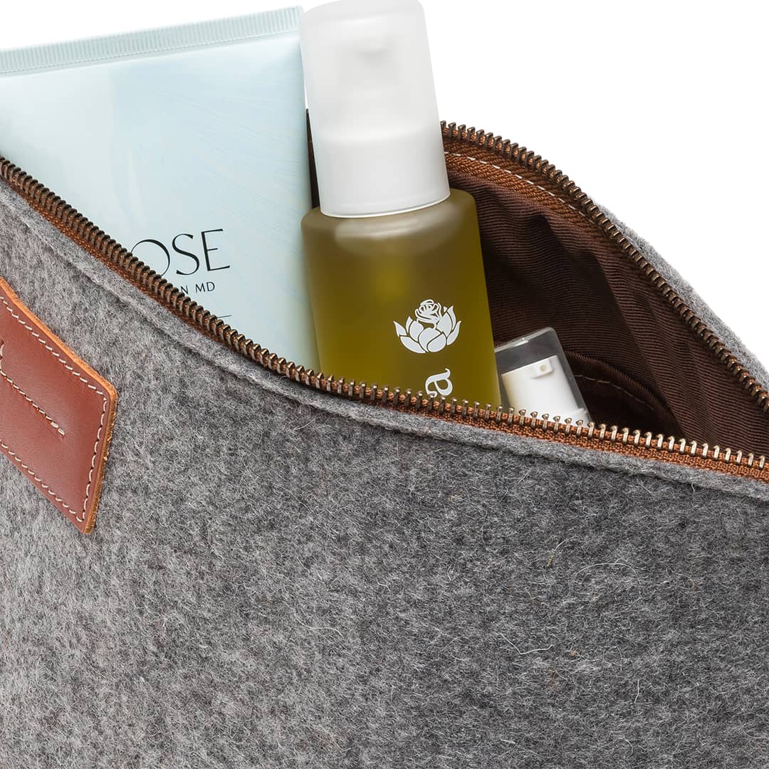 Kyrgies Felt and Leather Travel Kit, grey wool felt, interior view with toiletries