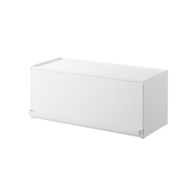 Closed white Yamazaki Home Open-Back Countertop Storage Rack - Steel isolated on white, showing its wide rectangular body, flat top, solid front panel and slim lower handle.