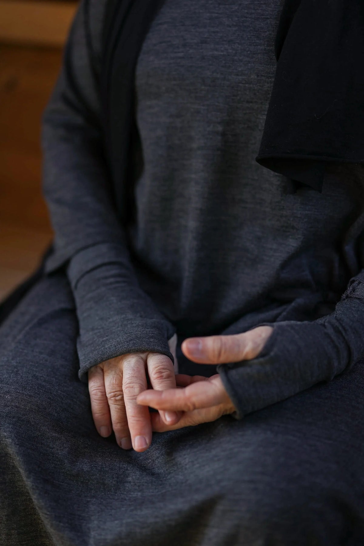 Merino wool fingerless gloves paired with a matching wool dress, ideal for recovery rituals, cool mornings, and quiet evenings.