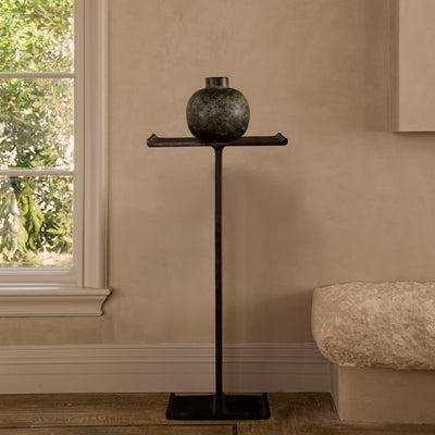 Minimal black cast iron finish pedestal table inspired by industrial I-beams